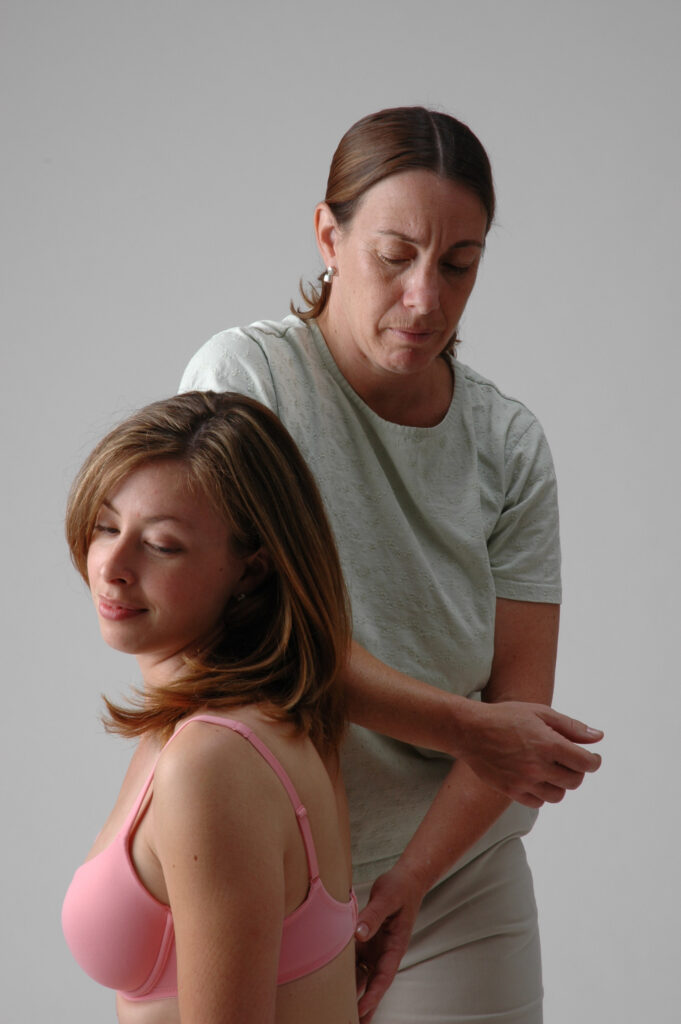 Sitting Rolfing SI back work